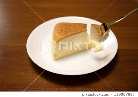 A single slice of soufflé cheesecake on a plate A single slice of soufflé cheesecake on a plate 139007935