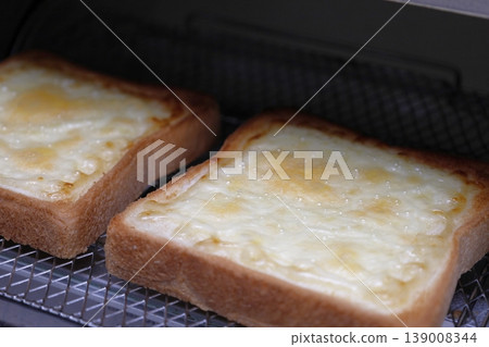 Freshly baked cheese toast 1 Freshly baked cheese toast 1 139008344