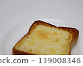 White plate and two slices of cheese toast 139008348