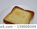 White plate and 3 cheese toasts 139008349