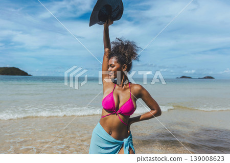 Sunlit beach, turquoise waves, distant islands Sunlit beach, turquoise waves, distant islands 139008623