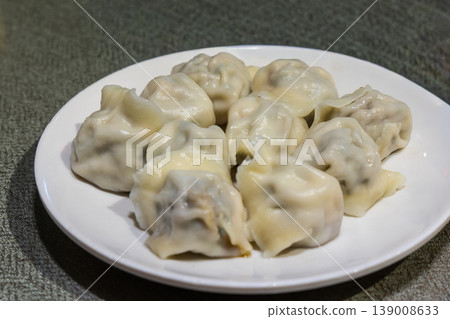 Beijing popular and delicious steam dumpling with abundant fillings in restaurant Beijing popular and delicious steam dumpling with abundant fillings in restaurant 139008633
