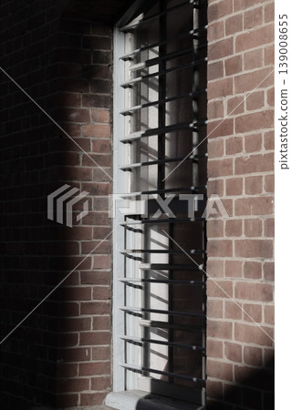 Red brick warehouse and brown brick wall 139008655