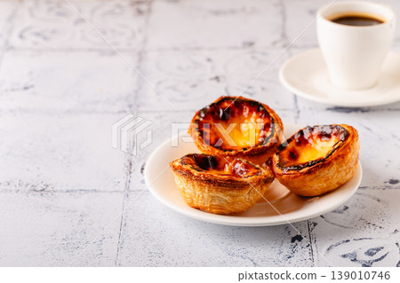 Egg tart, traditional Portuguese dessert, pastel Egg tart, traditional Portuguese dessert, pastel 139010746