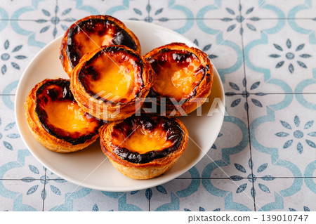 Egg tart, traditional Portuguese dessert, pastel Egg tart, traditional Portuguese dessert, pastel 139010747