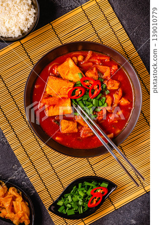 Korean traditional food, spicy kimchi soup (kimchi tige) with pork and tofu cheese. 139010779