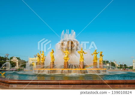 Golden fountain Friendship of people situated on exhibition of Economic achievements in Moscow, Russia. Golden fountain Friendship of people situated on exhibition of Economic achievements in Moscow, Russia. 139010824