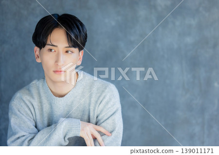 Young man in knitwear Young man in knitwear 139011171