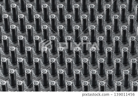 Close-Up of Metal Bolts in a Pattern Close-Up of Metal Bolts in a Pattern 139011456