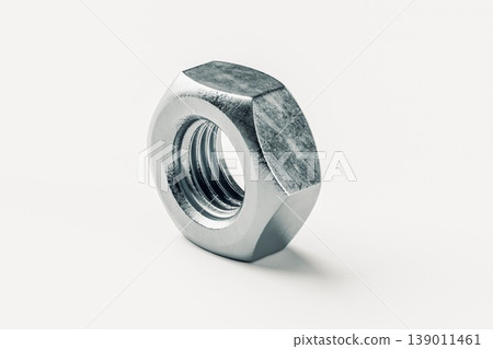 Close-Up of a Metallic Nut on a Light Background 139011461