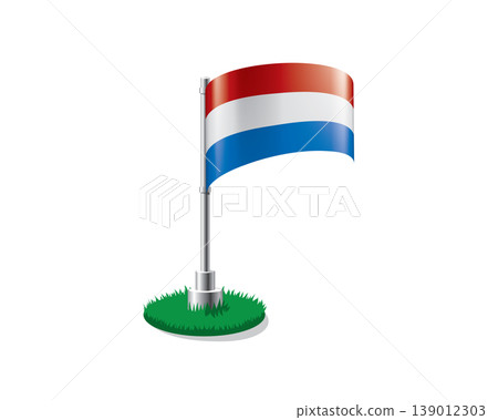 Netherlandish flag on a flagpole mounted on the grass Netherlandish flag on a flagpole mounted on the grass 139012303