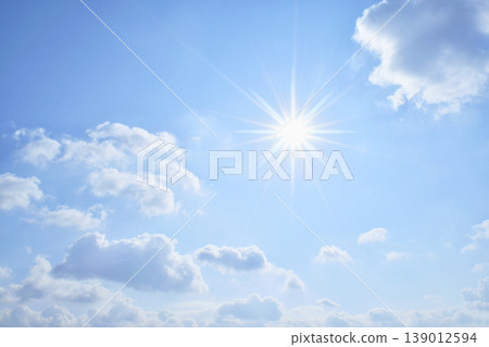 Blue sky and sun, direct sunlight, free space image 139012594