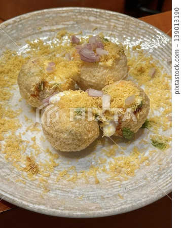 Traditional Indian Street Food Dahi Puri Chaat with Yogurt and Sev 139013190