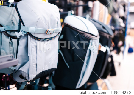 Various Backpacks on Retail Store Racks 139014250
