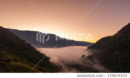 Aerial Sunrise View of Sapan Village Surrounded by Mist Aerial Sunrise View of Sapan Village Surrounded by Mist 139014324
