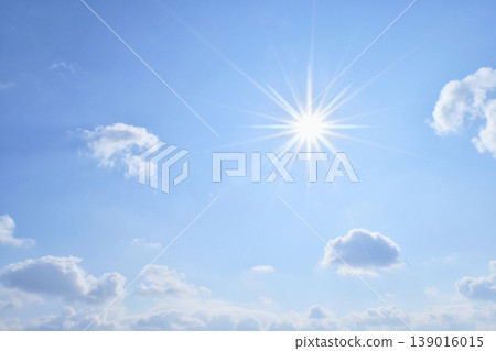 Blue sky and sun, direct sunlight, free space image 139016015