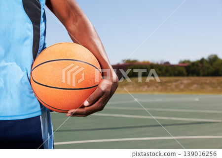 Basketball player, hand and court with ball outdoor in summer for sport, game and competition. Athlete, ready or start training, exercise or man closeup on playground for practice, workout or fitness Basketball player, hand and court with ball outdoor in summer for sport, game and competition. Athlete, ready or start training, exercise or man closeup on playground for practice, workout or fitness 139016256