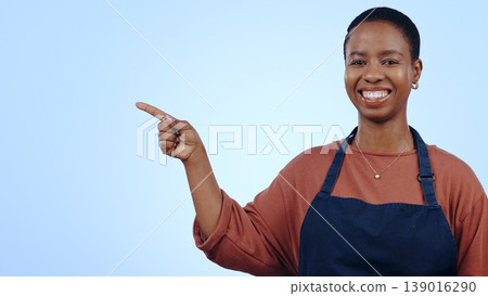 Woman, portrait and pointing for presentation in studio with smile, announcement or advertising space. Black person, face and smile for marketing, showing deal or discount with hand and joy on mockup Woman, portrait and pointing for presentation in studio with smile, announcement or advertising space. Black person, face and smile for marketing, showing deal or discount with hand and joy on mockup 139016290