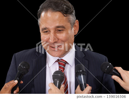 Microphone, business and man with press conference, smile and information on a dark studio background. Government official, person or interview with questions, statement and speaking with news or mic 139016306