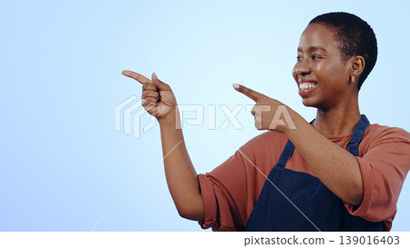 Woman, cafe and pointing for presentation in studio with hands, announcement or advertising space in smile. Black person, face or happy for marketing, showing deal or discount with pride on mock up 139016403