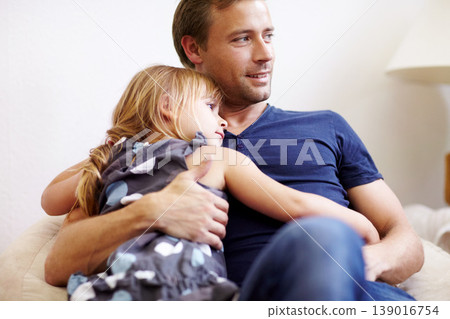 Father, girl and hug with smile, couch and embrace with love, daughter and house. Man, happy and lounge or bonding together for affection, family and parent with child, caring and family home Father, girl and hug with smile, couch and embrace with love, daughter and house. Man, happy and lounge or bonding together for affection, family and parent with child, caring and family home 139016754