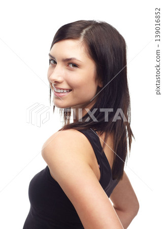 Happy young woman, face and portrait in fashion, style or clothing isolated against a white studio background. Attractive female person or model smile and posing in confidence, joy or natural beauty Happy young woman, face and portrait in fashion, style or clothing isolated against a white studio background. Attractive female person or model smile and posing in confidence, joy or natural beauty 139016852