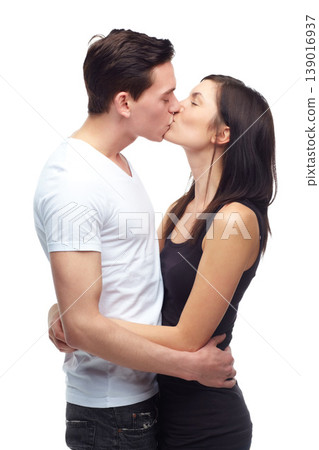 Happy couple, kiss and hug with love in studio mockup, romance and care in committed relationship for bonding. Young man, woman and date for marriage loyalty, support and together by white background Happy couple, kiss and hug with love in studio mockup, romance and care in committed relationship for bonding. Young man, woman and date for marriage loyalty, support and together by white background 139016937