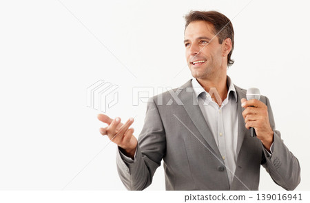 Man, microphone and smile in speech, studio and motivational or public speaker, tv and white background. Happy mature person, broadcast and feedback or voice, anchor and media or influencer in mockup Man, microphone and smile in speech, studio and motivational or public speaker, tv and white background. Happy mature person, broadcast and feedback or voice, anchor and media or influencer in mockup 139016941
