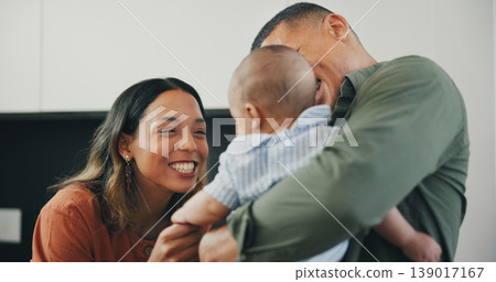 Family, smile and play or care, love and bonding in kitchen, relax and support or laughing at home. Happy parents and baby, connect and hug or embrace, fun and humor or conversation, silly and talk 139017167