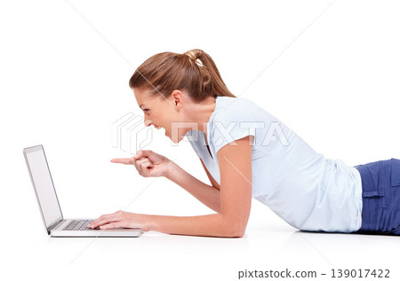 Studio laptop, excited and woman point at online advertising news, sales promo or social media info, ads or commercial. Wow, internet and floor person gesture at network offer on white background Studio laptop, excited and woman point at online advertising news, sales promo or social media info, ads or commercial. Wow, internet and floor person gesture at network offer on white background 139017422
