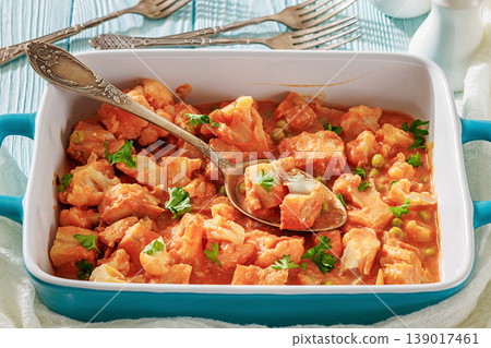 Indian fish curry with cauliflower and green peas 139017461