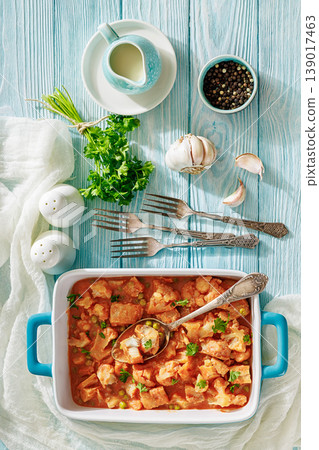 Indian fish curry with cauliflower and green peas Indian fish curry with cauliflower and green peas 139017463