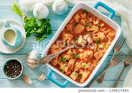 Indian fish curry with cauliflower and green peas 139017465