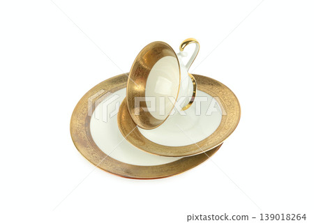 Elegant vintage teacup and saucers isolated on white. 139018264