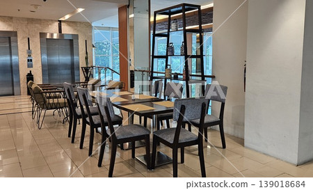 This is interior of cafe store with chair and table 139018684