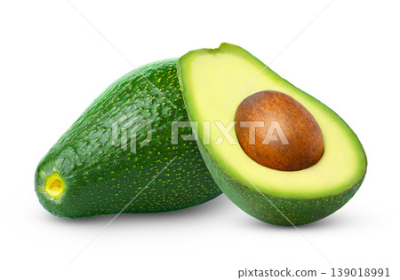 Green ripe avocados and half of avocado isolated on white background. Fuerte avocado with clipping path. Green ripe avocados and half of avocado isolated on white background. Fuerte avocado with clipping path. 139018991