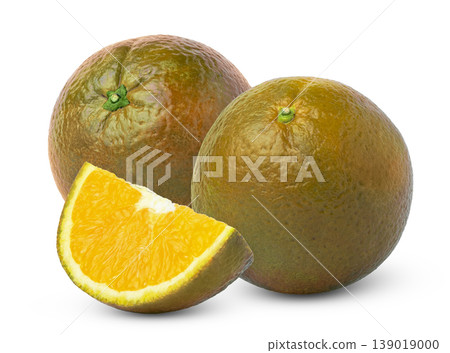 Two whole chocolate navel orange fruits and cut in a slice isolated. Bronze orange citrus fruit. Two whole chocolate navel orange fruits and cut in a slice isolated. Bronze orange citrus fruit. 139019000