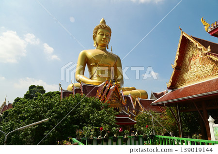 The Phra Phutthathamakaya Thepmongkol at Wat Pak Nam is a Buddha statue in the meditation posture, made of copper and standing 69 meters tall. It is the tallest Buddha statue in Bangkok . The Phra Phutthathamakaya Thepmongkol at Wat Pak Nam is a Buddha statue in the meditation posture, made of copper and standing 69 meters tall. It is the tallest Buddha statue in Bangkok . 139019144