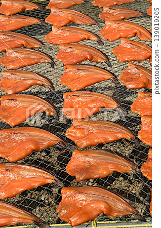 Texture or background of sun-dried striped snakehead fish has a salty taste, which is a type of food preservation used in Asia. 139019205