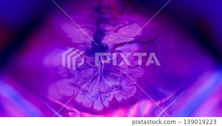 Splatter cube. Neon ink flowing. Defocused purple pink blue color splash chemical texture spilling on abstract acrylic background. 139019223