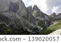 Majestic Vajolet Towers soaring above coniferous forest, Dolomites, Italy 139020057