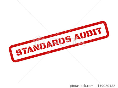 Red textured rectangular rubber stamp with STANDARDS AUDIT text for quality control inspection or regulatory review Red textured rectangular rubber stamp with STANDARDS AUDIT text for quality control inspection or regulatory review 139020382