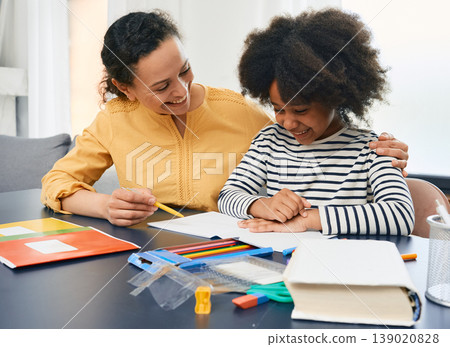 Professional female psychologist works with African American little girl. Positive child during a psychotherapy session Professional female psychologist works with African American little girl. Positive child during a psychotherapy session 139020828