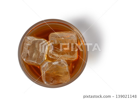 Whiskey with Ice Cubes on White Background Top View 139021148