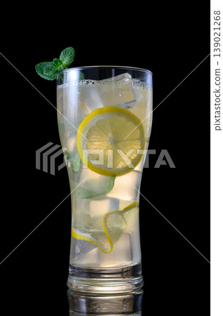 Refreshing Mojito with Ice and Mint on Black Refreshing Mojito with Ice and Mint on Black 139021268