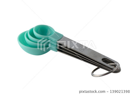 Set of green plastic spoons isolated on white background. Set of green plastic spoons isolated on white background. 139021398