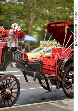 Elegant Horsedrawn Vehicle Paused On Manhattan Street Captured During Sunset Hours new york Elegant Horsedrawn Vehicle Paused On Manhattan Street Captured During Sunset Hours new york 139021636