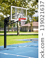 Calm Neighborhood Park Illuminated By Sunlight Showcasing Basketball Net And Rowhouses. New York 139021637