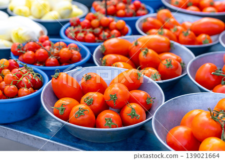 Tomatoes and various vegetables on a market stall 139021664