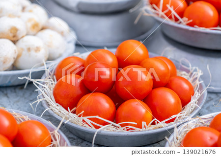 Tomatoes and various vegetables on a market stall 139021676